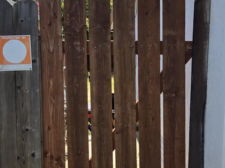 Fence pickets repaired and squared